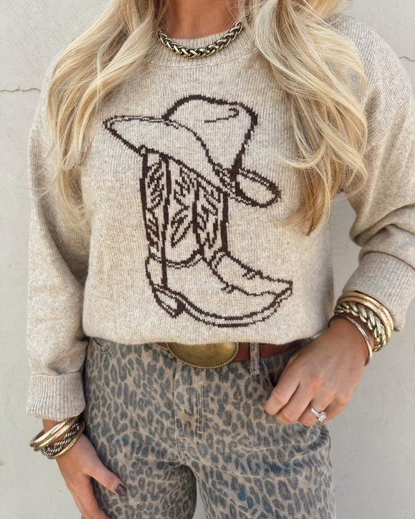 Western cowboy boots, hat and sweater