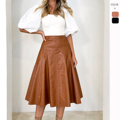 Leather and high waist pleated skirt